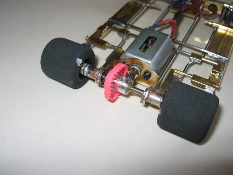 Rear end detail - pan attachment and rear rattlers. Bracket is JK modified by elongating the motor bearing and motor mounting holes to allow motor to sit level with bottom of chassis.